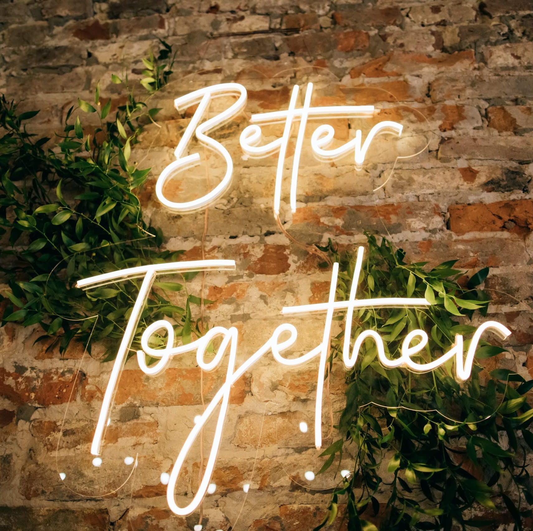 Better,Together,-,Neon,Sign,On,A,Brick,Wall,In